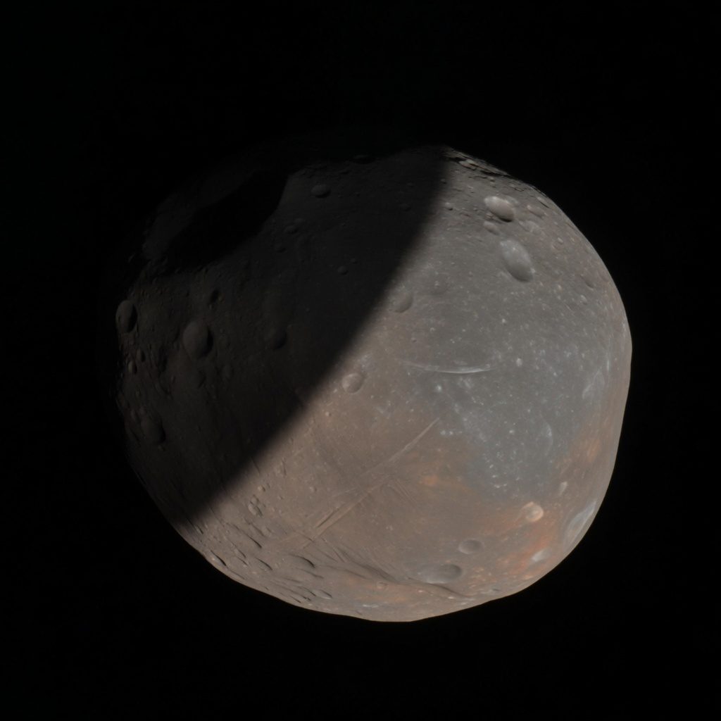 Illustration of a small cratered moon against black space.